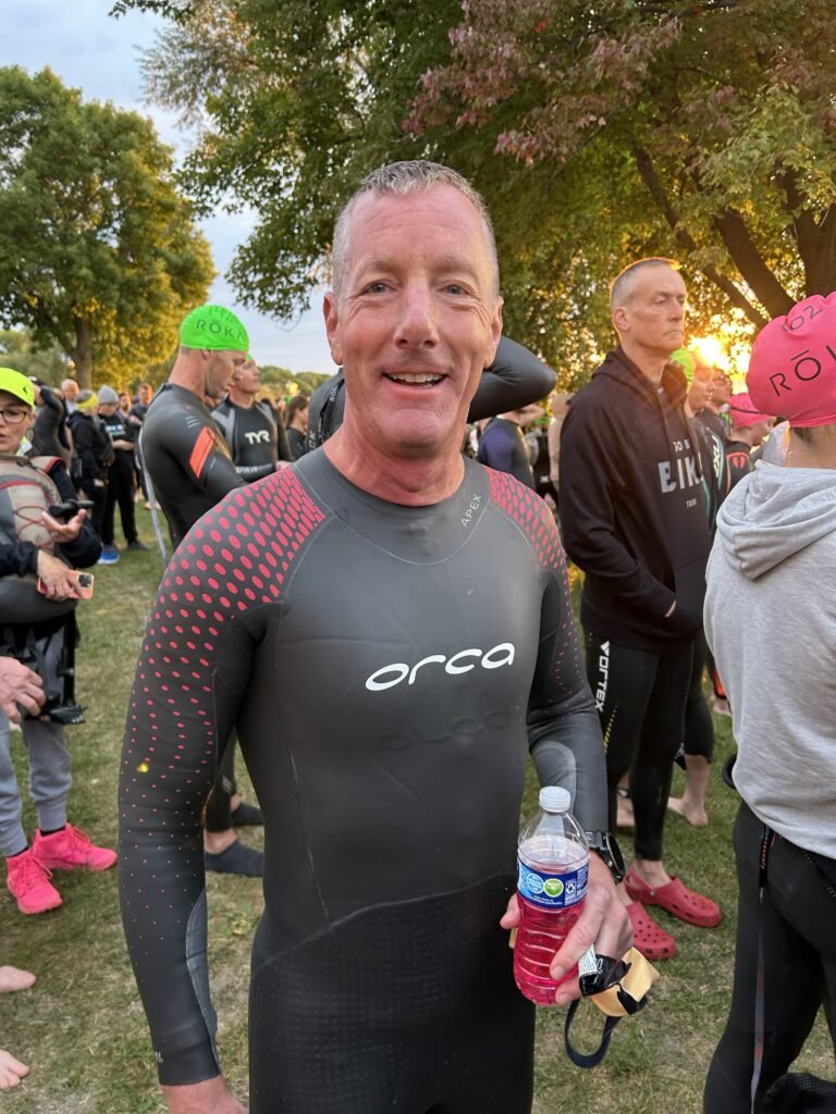 Ken Downer, author of Self-Coached to Kona, in his wetsuit preparing for an Ironman swim at 70.3 Wisconsin