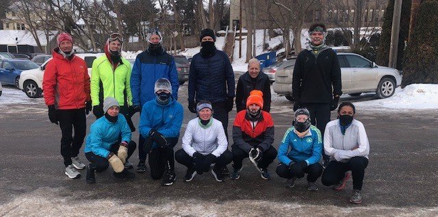 Ken Downer, author of Self-Coached to Kona, with members of his running group on a cold winter run