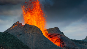 A volcano in Hawaii erupts, symbolic of the Goddess Pele and how she can help us be mentally strong during the tough moments of an Ironman triathlon